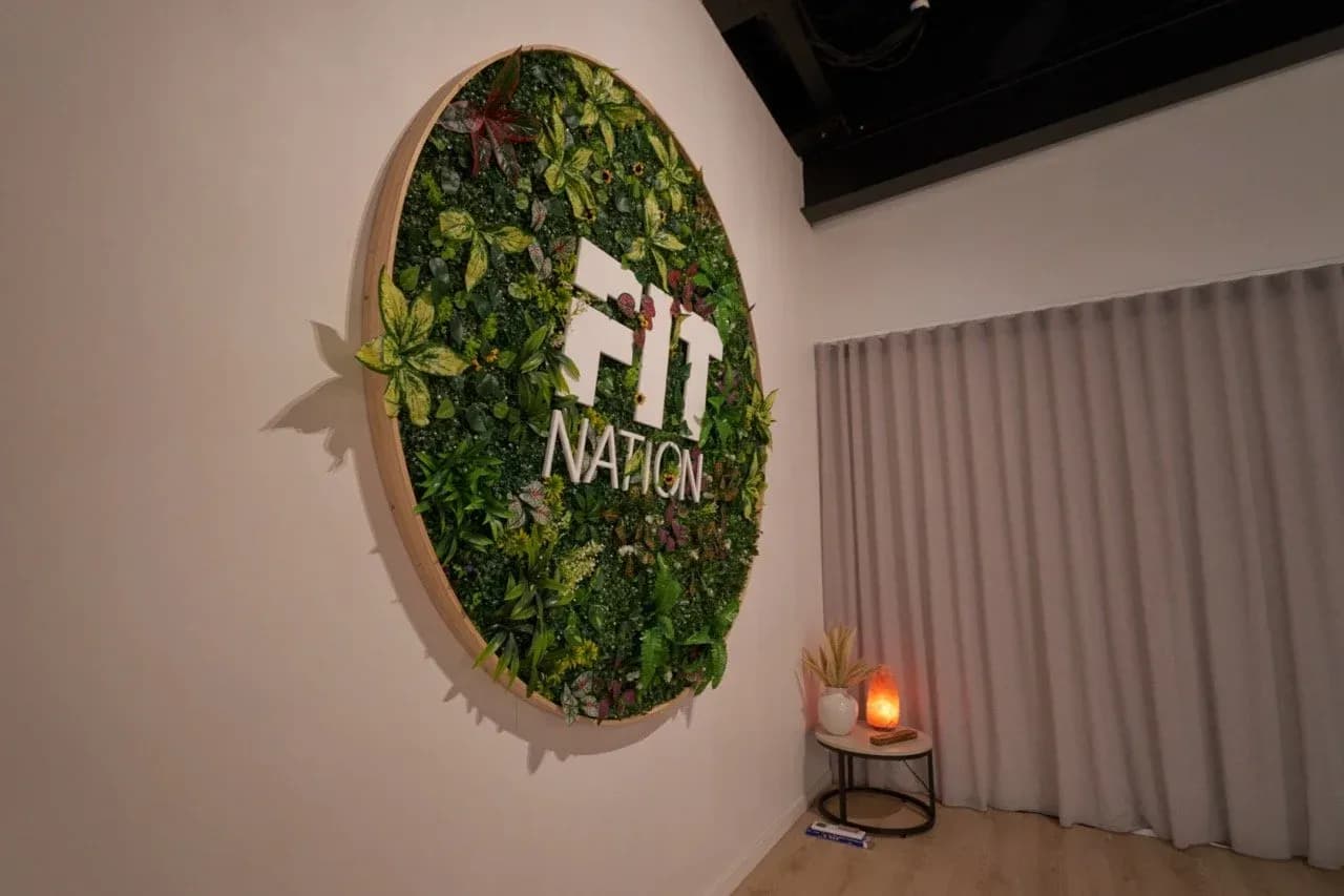 Fit Nation moss wall logo at the Papamoa studio