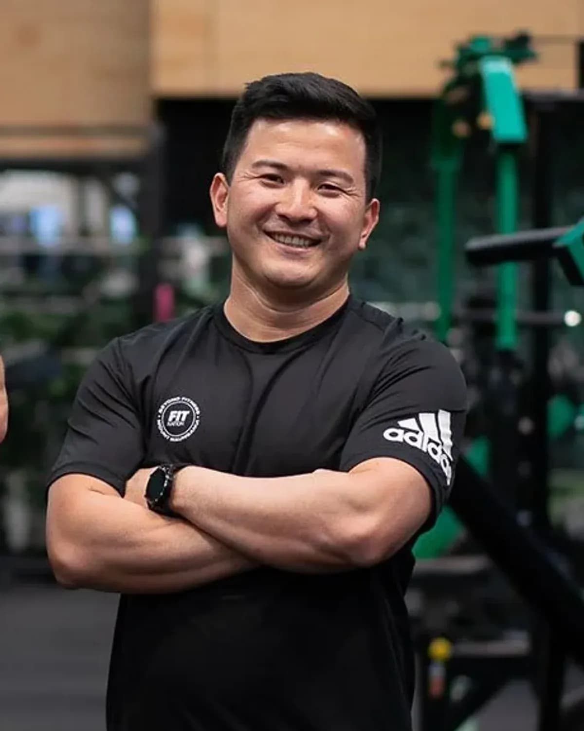 Yan, co-owner of Fit Nation, on the gym floor at Fit Nation Mount Maunganui